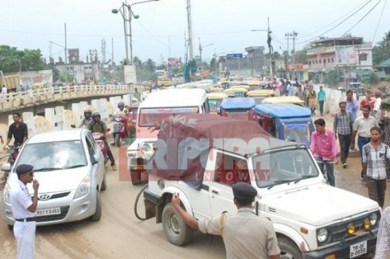 Flyover construction delays : Sudden change of route in traffic movement from Battala poses serious problem for the common people
